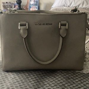 Grey Michael Kors bag. Removable cross body strap.
